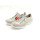Rieker Damen Slipper mit Stretch Zierschnürung und Zierreißverschluss beige kombi