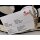 Rieker Damen Slipper mit Stretch Zierschnürung leicht sportlich vegan schwarz beige